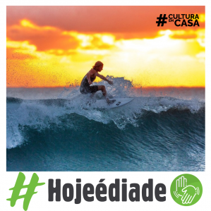 Imagem de um surfista pegando uma onda